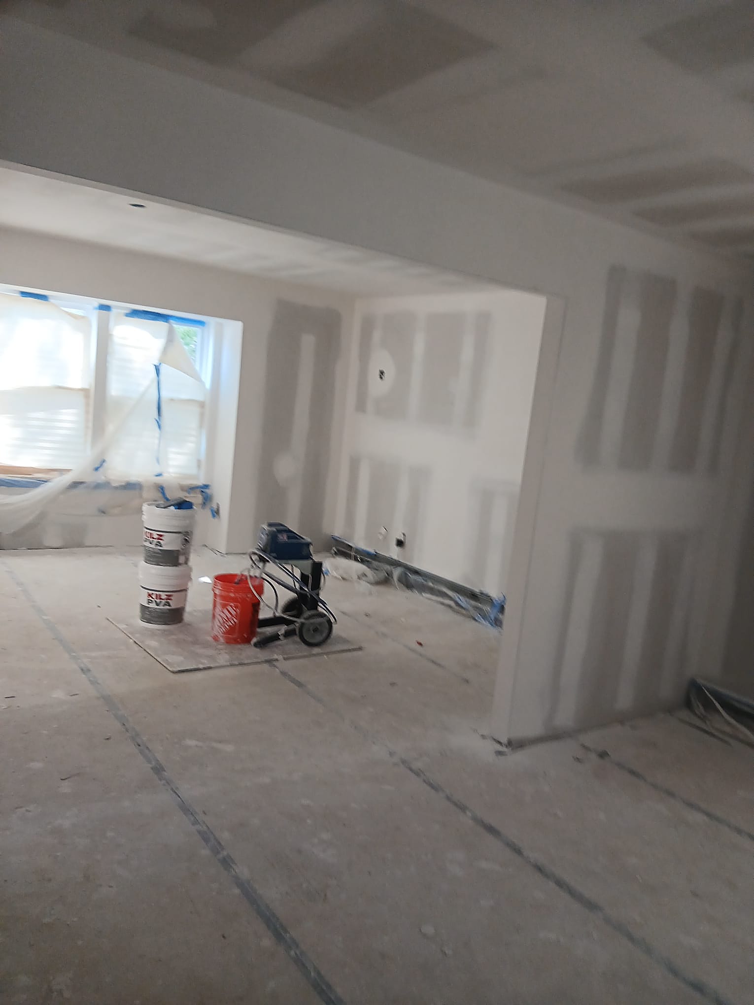 Freshly finished room with drywall and paint